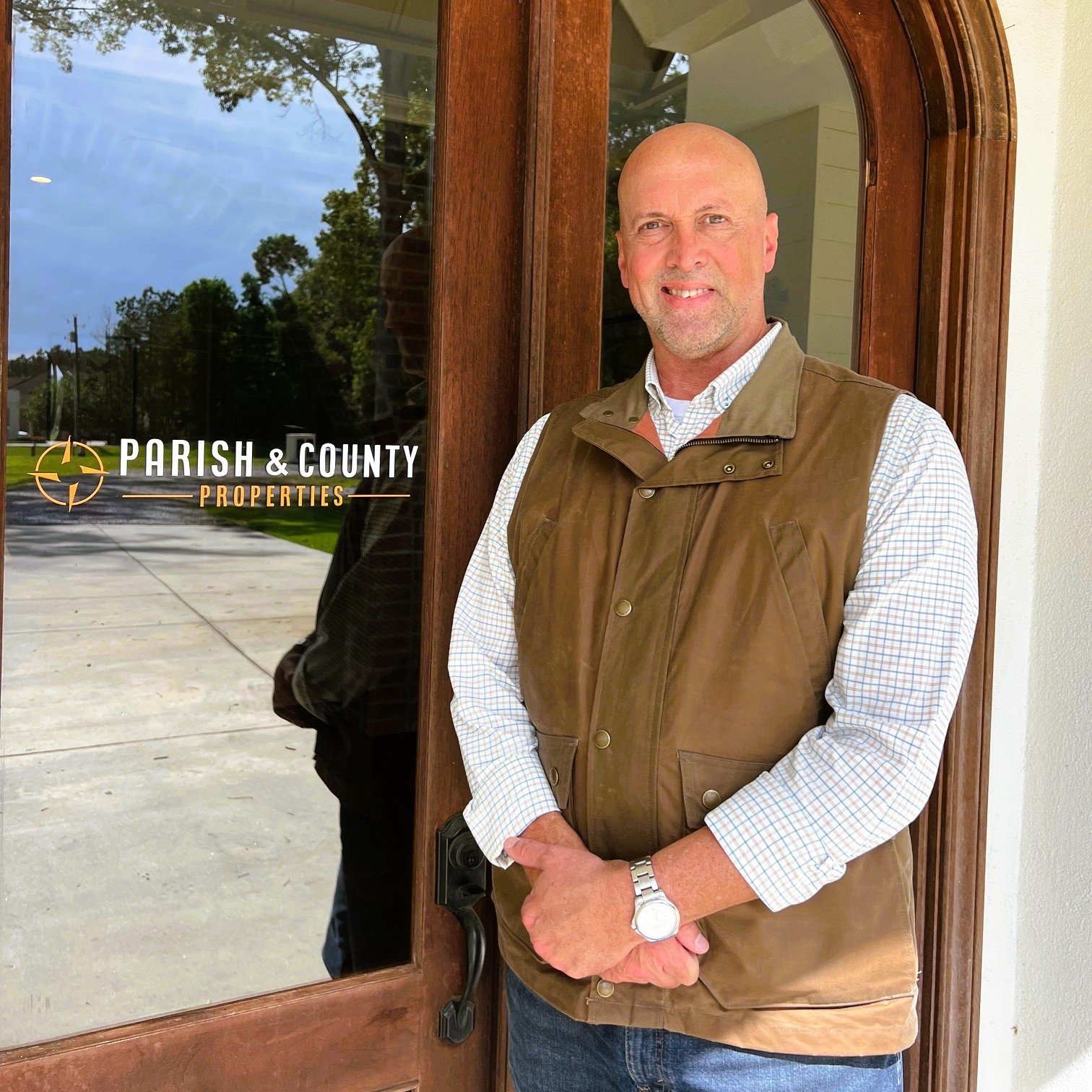 Parish & County Properties — agent at the door